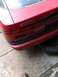 1989 Ford Probe - Rear view of a red car, showing the PROBE model name and a Keller Ford Inc. sticker.
