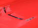 1971 Ford Ranchero - A close-up of a red car's hood reveals chrome accents and a '427' emblem, with visible watermarks.