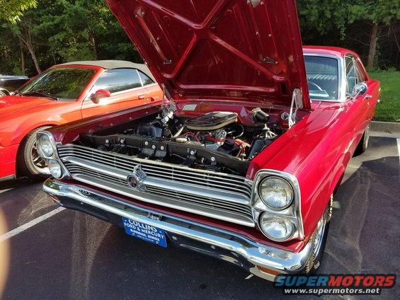 Red 1965 Ford Fairlane 500XL front view with hood open
