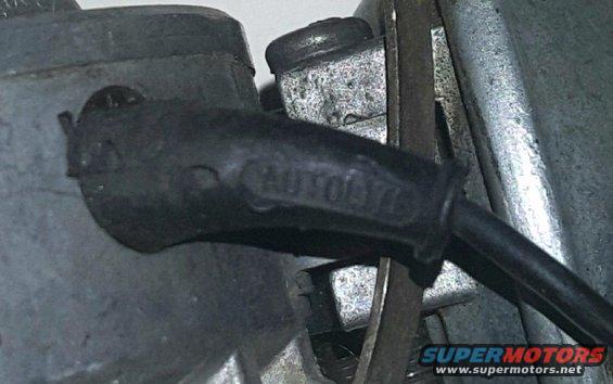 Spark plug wire boot with embossed text 'AUTOLITE 76'