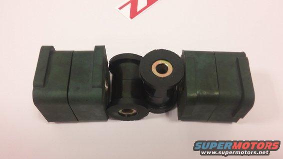 Four black suspension bushings with metal inserts