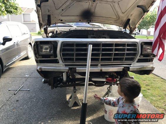 Had to pull wheels off to access front end grill and headlight bucket bolts