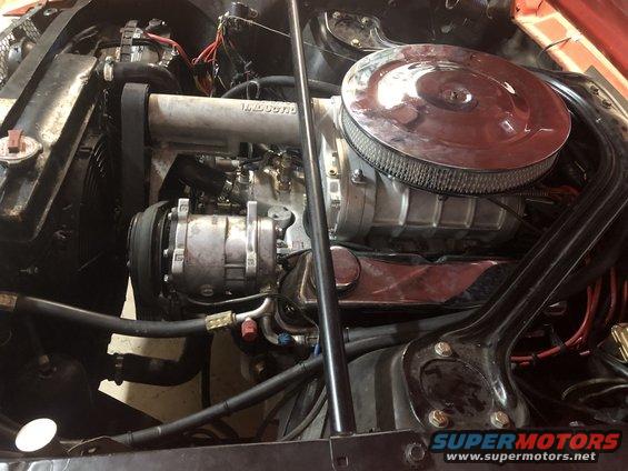 Engine bay with polished supercharger and air cleaner