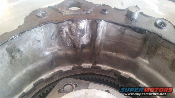 Transmission bell housing with internal gears visible