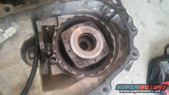 Close-up of automatic transmission internals showing torque converter and planetary gears