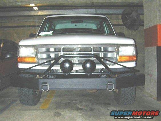 1995 Ford Bronco front view with custom bumper and dual spotlights