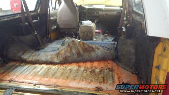 The rear window was broken and left open for several months. Because of the vinal interior the mat under the vinal could breath and even though the truck was sitting indoors with all the windows open for over a month before I stared working on it it was still wet inside and starting to rust from the he inside out.