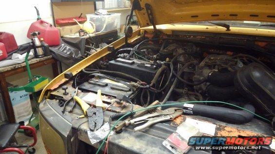 kimg0711.jpg I want to install an inverter, strobe package, lots of work lights, and multiple radios but I didn't want to have my engine running all the time with them on so I installed a huge deep cycle battery with a 200a relay between the stock battery and the new one. 

The relay is wired to only be on when the engine is running. Causing the deep cycle to be isolated when the engine is off. 

Which allows me to wire everything to that battery and it I run that battery down with my strobe lights I can still start my engine and not be stranded. 

Also in theory it will act as an auto jump starter if for some reason the main battery gets drained. 