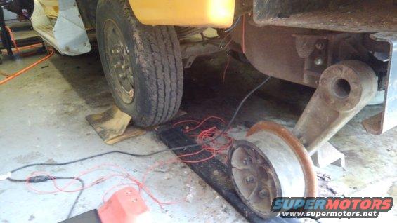 kimg0701.jpg Had to do some electrical work above the Hy rail wheels. So I had to quickly set up some &quot;rails&quot; for the truck to sit on so I don't damnage the floor of my auto mechanic's shop.