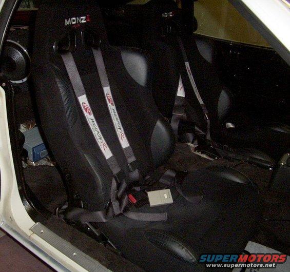 Interior view of racing seats with MONZ and MEATools branding