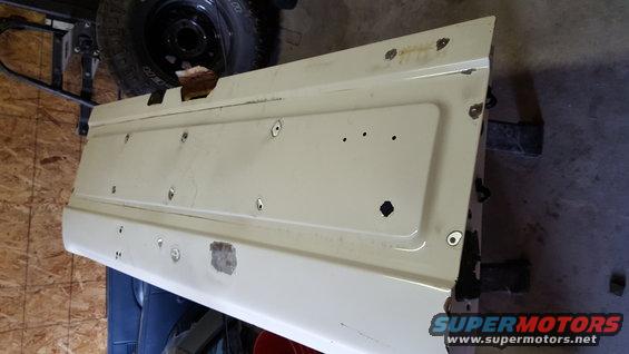 Prepping the rest of the tailgate.  This tailgate originally came with a fancy cover.  Not being overly fond of the cover, I'm going to be covering up the holes that it mounts to.  I thought about welding them up, but should I want one in the future I'll be able to locate/drill the holes easily.