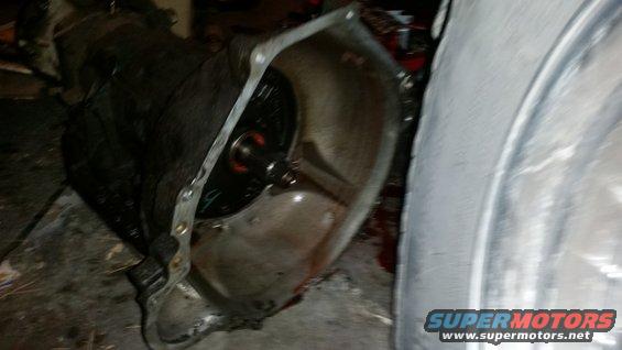 Transmission bell housing with torque converter visible inside