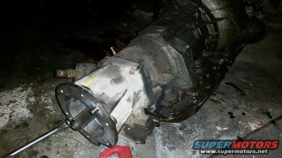 Transmission and transfer case assembly on concrete floor