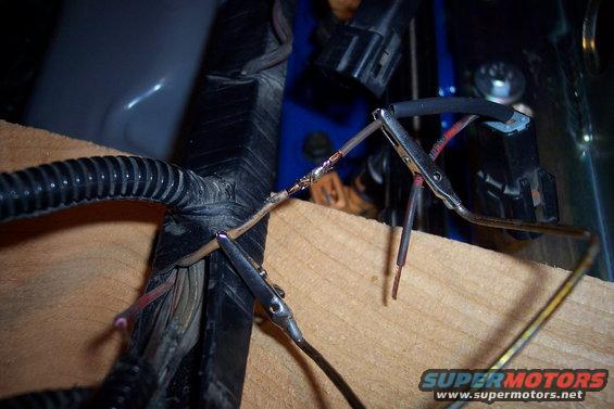 Wiring harness repair with alligator clips holding wires