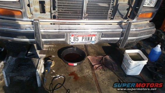 1985 Ford Bronco front bumper with oil drain pan and bucket