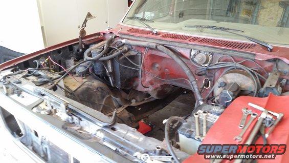 Engine bay with tools on red cloth