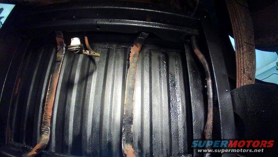 kimg0838.jpg Undercarriage where the tank goes got a coat of bed liner as well.