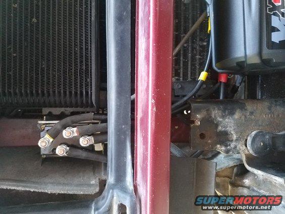 Winch wiring connected to radiator assembly