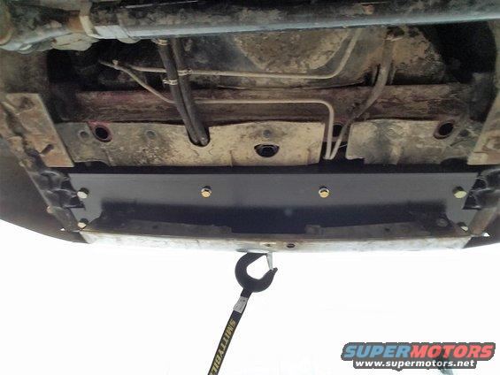 Underbody view of a winch mount plate installed on a vehicle