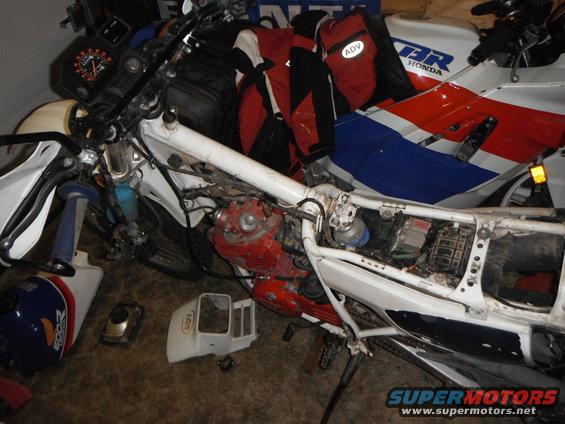 dscf2488.jpg just a quick teardown to locate why the headlight quit working on the way home well after the sun went down.  How fun was that?  not very.