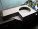 1994 Ford Bronco - A custom-built subwoofer enclosure is shown on a workbench, ready for installation.