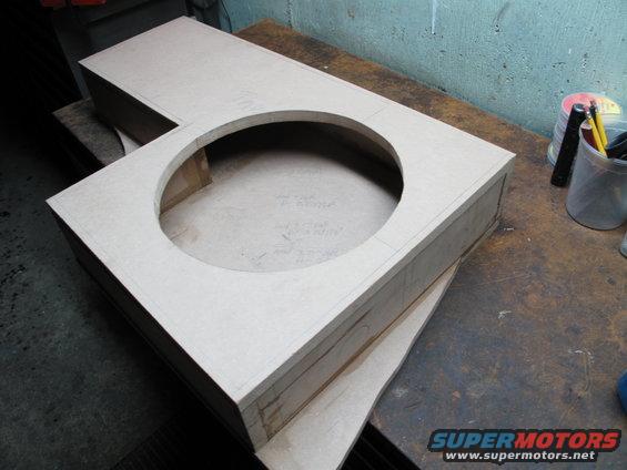 Custom subwoofer enclosure with circular cutout