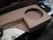 1994 Ford Bronco - MDF subwoofer box being built, a large circular opening for speaker installation.
