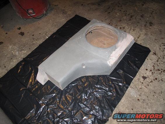 custom subwoofer box on black plastic sheeting