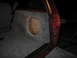 1994 Ford Bronco - A custom subwoofer enclosure is installed in the rear cargo area of a vehicle.