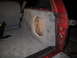 1994 Ford Bronco - Custom subwoofer box installation in the rear cargo area of a 1994 Ford Bronco.