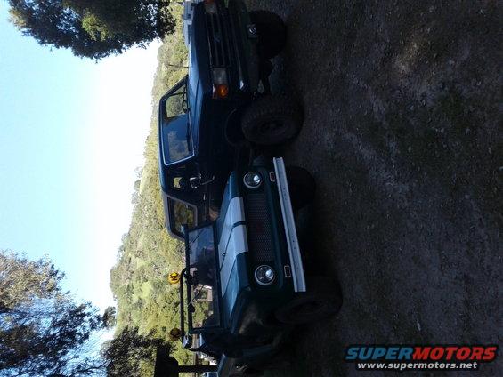 1991 Ford Bronco side view, white exterior
