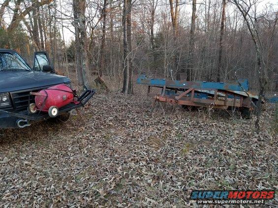 rotarytrailer09.jpg This Rotary 4-post lift was installed outdoors many years ago, and used there for at least a decade.  When it became mine, I moved it to a friend's back yard (woods), and eventually here, where it has been for almost 3 years.  Now, it's time to get it cleaned up, painted, & inside the shop.