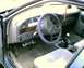 1986 Ford Taurus - Interior shot of pedals, shifter, and gauges.