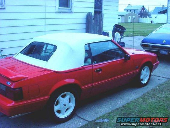 Red 1992 Ford Mustang convertible, 3q front view