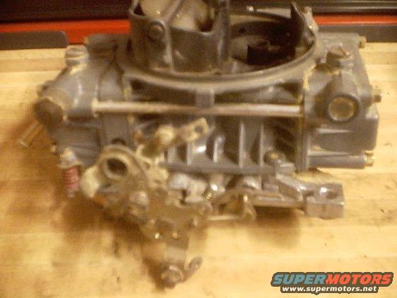carburetor on a wooden surface