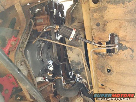 20181022_162438.jpg The lower radiator hose is routed so it doesn't rest against the PS box, and its split loom is positioned to protect it, if it ever does touch.

[url=https://www.supermotors.net/vehicles/registry/media/1142380][img]https://www.supermotors.net/getfile/1142380/thumbnail/20181014_175431.jpg[/img][/url]

The ATF cooler got 2 new pieces of correct hose, and a Magnefine. Rather than cutting, the hard line was simply bent to create space for the filter.

[url=https://www.supermotors.net/registry/media/1142332][img]https://www.supermotors.net/getfile/1142332/thumbnail/20181009_152002.jpg[/img][/url] . [url=https://www.supermotors.net/registry/media/943715][img]https://www.supermotors.net/getfile/943715/thumbnail/magnefinetrans.jpg[/img][/url] . [url=https://www.supermotors.net/registry/media/950474][img]https://www.supermotors.net/getfile/950474/thumbnail/magnefines.jpg[/img][/url]
__________________________________________
TSB 00-23-10 Transmission Fluid In-Line Filter Kit
https://www.amazon.com/dp/B000C8RAYE 
https://www.amazon.com/dp/B001TITC0Q 
https://www.amazon.com/dp/B000CIKJMY 

Publication Date: NOVEMBER 6, 2000 

FORD:
1980-1997 THUNDERBIRD 
1980-2001 CROWN VICTORIA 
1984-2001 MUSTANG 
1985-1990 BRONCO II 
1985-2001 RANGER 
1987-1997 AEROSTAR 
1989-1996 BRONCO 
1989-1997 F SUPER DUTY, F-250 HD 
1989-2001 ECONOLINE, F-150, F-250 LD, F-350, F-450 
1991-2002 EXPLORER 
1997-2001 EXPEDITION 
1999-2001 F-250 HD, SUPER DUTY F SERIES 
2000-2001 EXCURSION

LINCOLN:
1982-2001 TOWN CAR 
2000-2001 LS 
1998-2001 NAVIGATOR

MERCURY:
1980-2001 GRAND MARQUIS 
1987-1997 COUGAR 
1997-2002 MOUNTAINEER 

ISSUE: Contamination from prior transmission concerns or excess wear may be trapped in the transmission fluid cooling system. This debris must be removed by properly cleaning the transmission cooling system. After cleaning, some contamination may still remain. The remaining contamination may be reintroduced into the fluid cooling system of a repaired/replaced transmission causing premature or repeat failures. 

ACTION: After every overhaul or transmission exchange, clean, flush and backflush the transmission fluid cooling system which includes: fluid cooler, auxiliary cooler, cooler lines, and Cooler Bypass Valve (CBV), if equipped. Perform the cooler flow test to ensure proper transmission fluid flow volume on the transmission return line through the cooling system. Once proper fluid flow volume is verified install the Transmission Fluid In-Line Filter Kit (XC3Z-7B155-AA) in the fluid cooler return line (transmission fluid flow coming out of the fluid cooler going into the transmission). Refer to the following Service Procedure for details. 

SERVICE PROCEDURE 

NOTE: THIS IN-LINE TRANSMISSION FLUID FILTER KIT CAN BE INSTALLED ON ALL TRANSMISSIONS WITH 8mm (5/16&quot;) AND 9.5mm (3/8&quot;) TRANSMISSION FLUID COOLER LINES. 

NOTE: THIS IN-LINE TRANSMISSION FLUID FILTER KIT WILL ALSO BE SUPPLIED WITH ALL E4OD/4R100 AND OTHER FORD QUALITY REMANUFACTURED (FQR) TRANSMISSIONS. AFTER ANY OVERHAUL OR TRANSMISSION EXCHANGE PRIOR TO CONNECTING THE TRANSMISSION FLUID COOLING SYSTEM TO THE TRANSMISSION, FOLLOW THE STEPS BELOW. 

Clean, flush and backflush transmission fluid cooling system.

NOTE: VEHICLES EQUIPPED WITH STAND-ALONE OIL-TO-AIR (OTA) FLUID COOLERS CANNOT BE PROPERLY FLUSHED. ADDITIONALLY, 1998-2001 CROWN VICTORIA/GRAND MARQUIS AND TOWN CAR HAVE OIL-TO-AIR (OTA) FLUID COOLERS EQUIPPED WITH A TERMINAL BY-PASS VALVE. FOR ALL VEHICLES EQUIPPED WITH STAND-ALONE OTA COOLERS, THE OTA COOLER MUST BE REPLACED ON EVERY OVERHAUL OR TRANSMISSION EXCHANGE. REFER TO THE APPROPRIATE SERVICE/WORKSHOP MANUAL FOR PROCEDURE. 

Once the fluid cooling system has been cleaned, flushed and backflushed, connect the cooler lines and perform the transmission fluid flow test to ensure proper fluid flow. Refer to the appropriate Service/Workshop Manual for procedure. If proper fluid flow volume is not obtained, refer to appropriate Service/Workshop Manual for repair procedure. The transmission fluid coolers, auxiliary cooler, OTA, cooler lines, CBV (if equipped), transmission fluid pump or internal filter may be restricted or damaged and require replacement. 
CAUTION: FAILURE TO FOLLOW THE KIT INSTRUCTIONS MAY CAUSE INTERNAL TRANSMISSION ASSEMBLY DAMAGE AND REPEAT REPAIRS. 
Only after proper transmission fluid flow volume is present, install the Transmission Fluid In-Line Filter Kit (XC3Z-7B155-AA). Follow the instructions provided with the kit.

Once the filter is installed: 
With the transmission fluid return line disconnected from the transmission, verify fluid flow through the filter. Once the fluid flow in-and-out of the filter is verified, connect the transmission fluid return line to the transmission. Check and adjust proper transmission fluid level to normal operating range at normal operating temperature and check for leaks, kinks and chafe points (refer to the &quot;Do's and Don'ts&quot; chart in the kit instructions).

NOTE: THE FILTER INCLUDED IN THIS KIT WILL ALSO BE AVAILABLE AS A SEPARATE PART (XC3Z-7B155-BA). IT IS RECOMMENDED THAT THIS IN-LINE FILTER BE CHANGED EVERY 48,000 KILOMETERS (30,000 MILES). 

PART NUMBER PART NAME 
XC3Z-7B155-AA Transmission Fluid In-Line Filter Kit (Complete) 
XC3Z-7B155-BA In-Line Filter Only (Separate) 

OTHER APPLICABLE ARTICLES: NONE 
SUPERSEDES: 00-03-08 
WARRANTY STATUS: Eligible Under The Provisions Of Bumper To Bumper Warranty Coverage 

OPERATION DESCRIPTION TIME 
002310AB Perform Flow Test And Install In-Line Fluid Filter 0.7 Hr. 
002310A Additional Time To Retest Fluid Flow Before Installing In-Line Filter (To Be Used Only After Additional Repairs Are Performed) 0.3 Hr.

http://www.fcsdchemicalsandlubricants.com/Main/quickref/atf.pdf