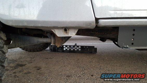 I decided to make the rock sliders to go along with the step.  In order to mount it to the front of the truck, I've decided to use the fender mounting location.  In order to do this it is necessary not only to remove the bolt that holds the lower part of the fender in place, but to also remove the threaded clip. 