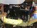 1970 Volkswagen Beetle - The engine bay of a custom dune buggy reveals exposed wiring and mechanical parts.