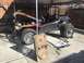 1970 Volkswagen Beetle - A custom dune buggy is parked outside under a canopy, with its hood open and a fuel tank removed.