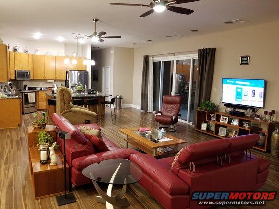 20180803_231709.jpg Our couches were getting pretty worn-out, so when our furniture store announced a going-out-of-bidness sale, we chose these red ones.  They're pretty close to the color of the recliner.  We also got the triangular glass table and the bar stools (finally).