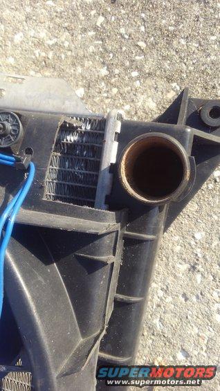 kimg0310.jpg the shroud is bigger than it really should be. have to do some mods to make it fit properly. 

both the inlet and outlet needed room so i had to cut out the corrners