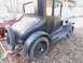 1909 Ford Model T - This 1909 Ford Model T coupe is seen from the rear quarter, showing its spare tire mounted on the back.