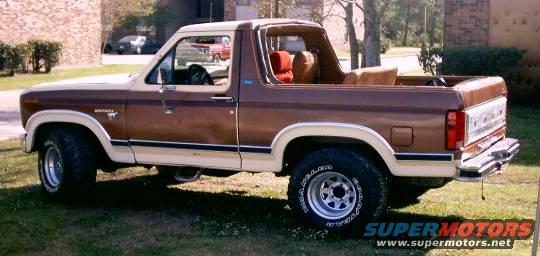 Brown 1980 Ford Bronco with tan trim, viewed from the side