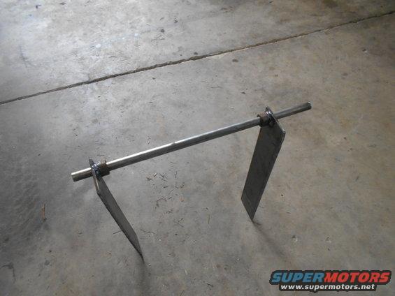 Metal part with rod and two flat plates