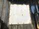 1992 Ford Bronco - Close-up of a patched metal floor section, likely from a vehicle's interior.