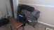 2006 Honda RANCHER - Items are stacked in a room, obscuring any potential vehicle details.