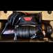 1995 Ford Bronco - A Warn VR10-S winch, likely new in its packaging, is shown with its synthetic rope coiled.