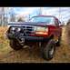 1995 Ford Bronco - This 1995 Ford Bronco features a custom winch bumper and BFGoodrich tires, ready for off-road adventures.