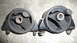1993 Mazda MX-3 - Two engine mounts are shown side-by-side on a concrete surface.