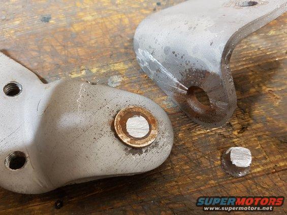 1978-ford-bronco--passenger-side-tailgate-hinge-3.jpg Loose passenger side tailgate hinge, disassembled


The pin was not only necked down and loose where it was crimped to the tailgate side of the hinge, but also seized in the bushing on the body side of the hinge. All pivoting was taking place on the wrong portion of the pin.